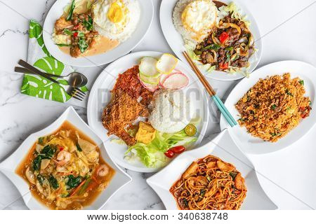 Variety Of Delicious Asia Muslim Malay Daily Home Cooked Food On Table. Flat Lay Top Down Table View