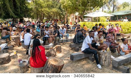 Johannesburg, South Africa - October 2019: People Eating And Socializing At Fourways Farmers Market