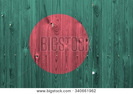 Bangladesh Flag Depicted In Bright Paint Colors On Old Wooden Wall. Textured Banner On Rough Backgro