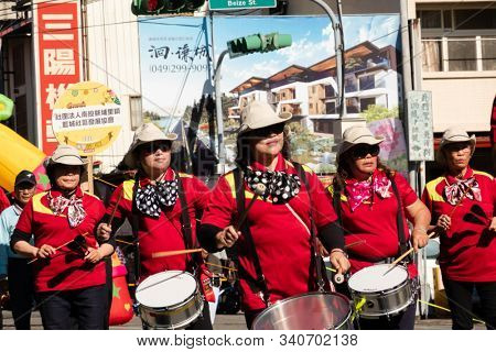 Puli, Taiwan - December 14th, 2019: people parade in Puli carnival at Nantou, Taiwan