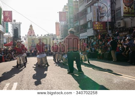 Puli, Taiwan - December 14th, 2019: people parade in Puli carnival at Nantou, Taiwan