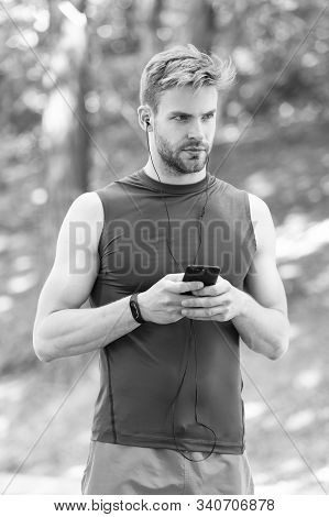 Set Up Route For Run Using Application. Man Smartphone Ready To Start Jog. Set Up Application. Sport