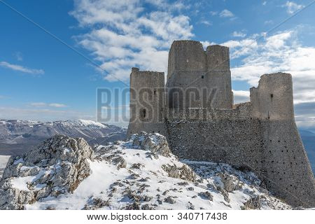 Ancient Fortress In The Abruzzesi Mountains, Snowy Mountain Landscape Of Campo Imperatore - Piana De