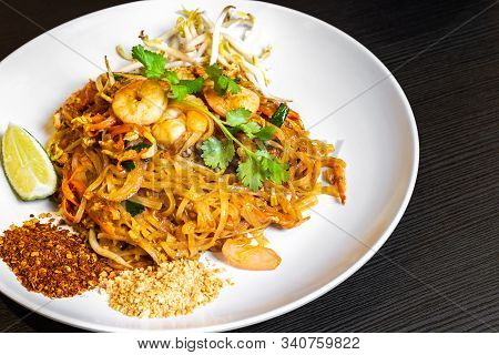 Pad Thai, Or Phad Thai, Is A Stir-fried Rice Noodle Traditional Dish Served As A Street Food In Thai