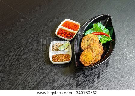 Spicy Fried Fish Cake, (tod Mun Pla), A Traditional Thailand Appetizer Is Made With Fresh Fish Paste