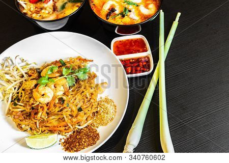 Pad Thai, Or Phad Thai, Is A Stir-fried Rice Noodle Traditional Dish Served As A Street Food In Thai