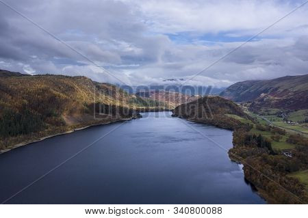 Beautiful Aerial Drone Landscape Image Of Glorious Autumn Fall Sun Over Thirlmere In Lake District