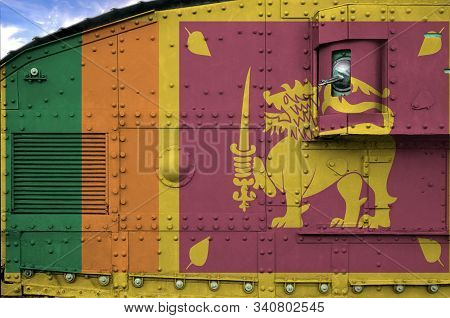 Sri Lanka Flag Depicted On Side Part Of Military Armored Tank Closeup. Army Forces Conceptual Backgr