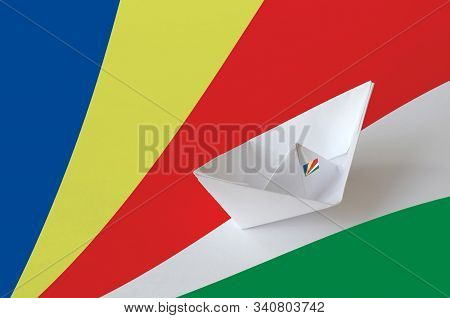 Seychelles Flag Depicted On Paper Origami Ship Closeup. Handmade Arts Concept