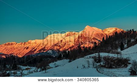 Winter Sunset In The Julian Alps