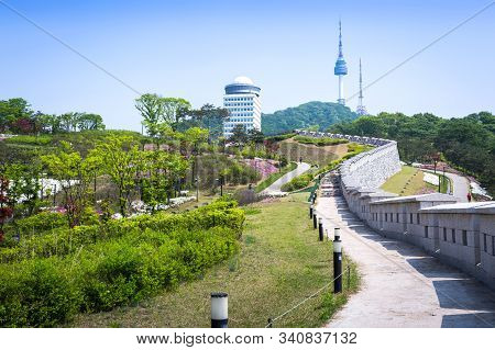 Seoul City Park With Old Wall And N Seoul Tower Behind, Seoul, South Korea.