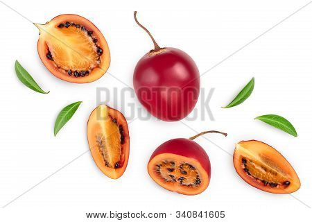 Fresh Tamarillo Fruit With Leaves Isolated On White Background. Top View. Flat Lay