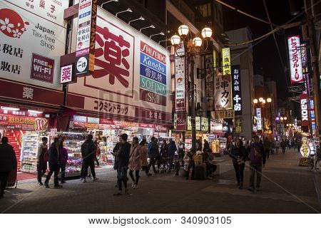 Osaka, Japan- 27 Nov, 2019: Beautiful Landscape View Of Japanese Store With Crowd Of Peoples And Tou