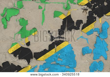 Tanzania Flag Depicted In Paint Colors On Old Obsolete Messy Concrete Wall Closeup. Textured Banner 