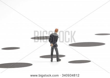 A Mini Figure Face On The Trapping Of Hole.