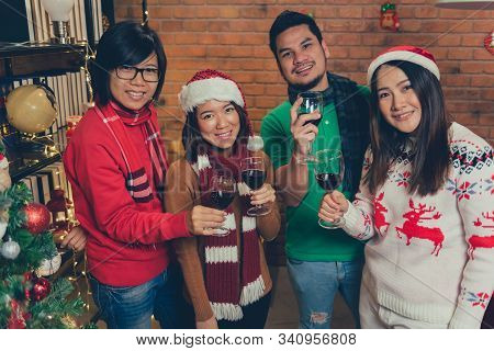 Christmas And New Year Party With Friends. Winter And End Of Year Celebrating Party At Home.