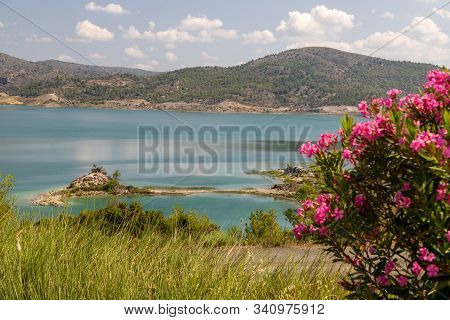 Scenic View At The Gadoura Water Reservoir On Rhodes Island, Greece With Blue And Turquoise Water, P