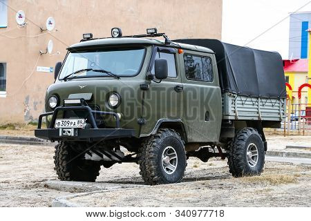 Pangody, Russia - June 1, 2019: Lifted Offroad Truck Uaz 39094 Farmer In The Town Street.