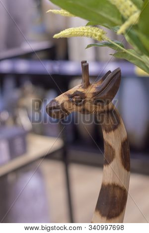 Head And Neck Of  Decorative Figure Of  Giraffe. Front View. Surgut, Russia - December 10, 2019.