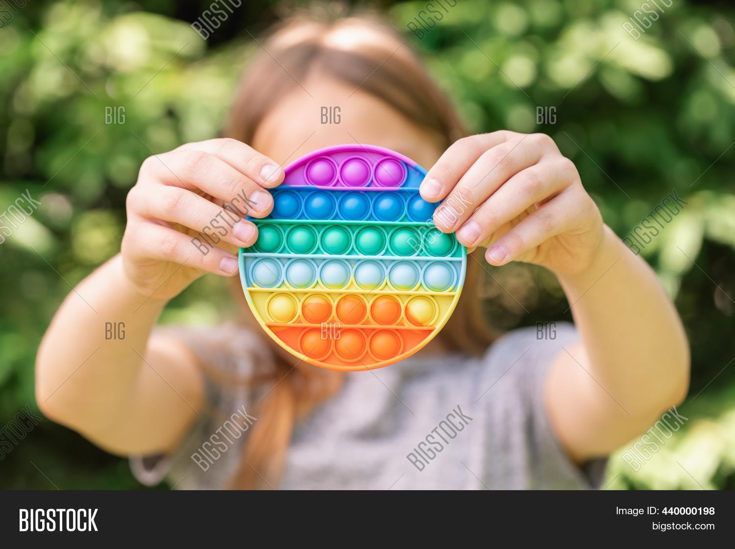 Little Girl Holding Image & Photo (Free Trial) | Bigstock