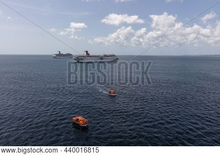 Saint Vincent - May 8, 2020: Aerial Shot Of Carnival Fascination Anchored By The Island. Two Orange 