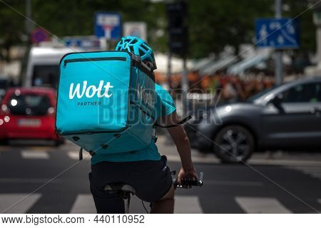Belgrade, Serbia - June 16, 2021: Wolt Delivery Man Driving In Belgrade With His . Wolt Is A Finnish