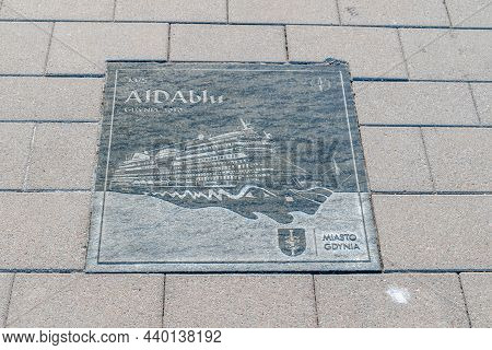 Gdynia, Poland - August 1, 2021: Plaque Of Aidablu At Passenger Ships Alley Visiting Gdynia.