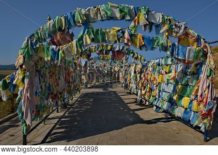 Ulan-ude. Russia. August 28, 2021. Alley With Prayer Flags And Khadaks (ritual Long Silk Scarf) In T