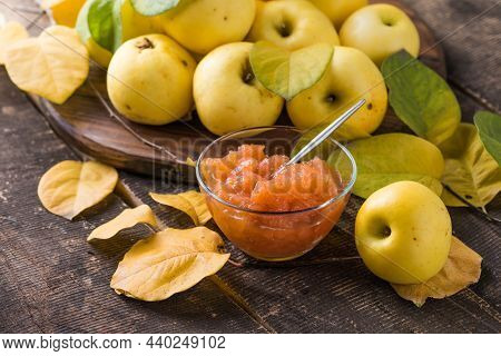 Fresh Homemade Apple Marmalade Jam In Glass Jar On A Wooden Background. Several Fresh Apples. Collec