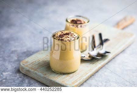 Custard Cream In Glasses With Chocolate, Milk Pudding. Natillas, Typical Christmas Dessert Made Of M