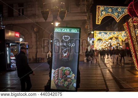 Belgrade, Serbia - December 21, 2020: Selective Blur On A Delivery Guy From Car Go Butler. Part Of C