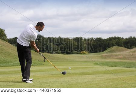Golfer In Action At Stade Francais Open 2008 In Coruson
