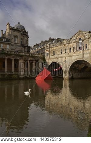 Bath, England, United Kingdom - October 30, 2021: Artwork Marking Cop26 Comprising A Red Sinking Hou