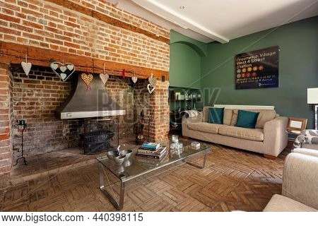 Ashdon, England  - July 25 2019: Traditional Farmhouse Living Room Inside British Home With Large Ex