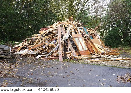 Fire Wood From Demolition Of Derelict House On Construction Building Site