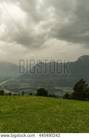 Triesenberg, Liechtenstein, June 20, 2021 Lovely View Over The Alps And The Rhine Valley On An Overc