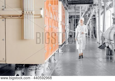 Operator Checks Operation Of Vibrating Machine For Sifting Flour From Wheat And Cereals, Industry Au