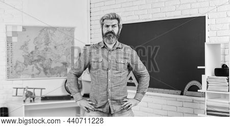 School Subject. Basic Education. History And Geography. Science Concept. Mature Bearded Teacher In C