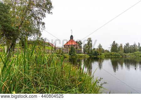 Beautiful Autumn View Of The Ancient Fortress Korela In Priozersk. Stone Fortress In Karelia. Mediev