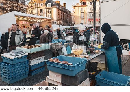 Dieppe, France - November 17, 2018: Vendors Sell Freshly Caught Fresh Scallops At The Fair Of Herrin