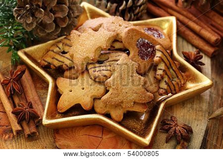 Christmas cakes on brown background