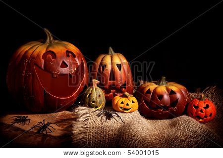 Still life with pumpkins, black background