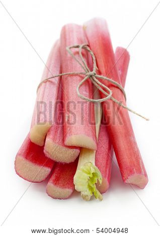 Bunch of fresh rhubarb isolated on white background