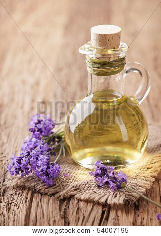Lavender spa treatment on wooden background