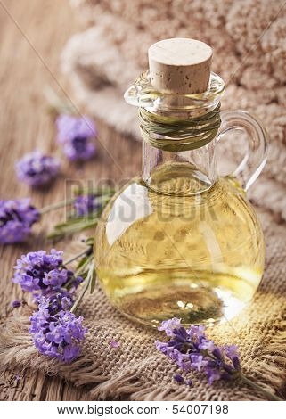 Lavender spa treatment on wooden background