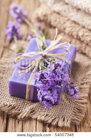 Lavender spa treatment on wooden background