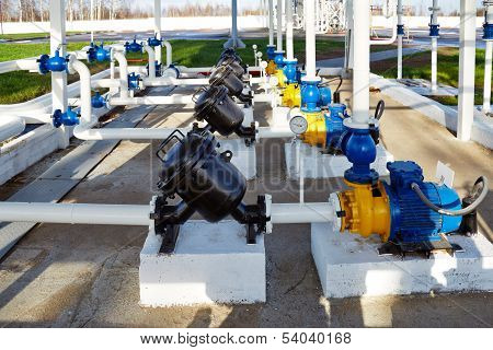 pipes, pump and filter at oil storage