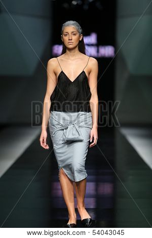 ZAGREB, CROATIA - OCTOBER 17: Fashion model wearing clothes designed by Petra Vuletic and Sasa Hortig on the 'Fashion.hr' show on October 17, 2013 in Zagreb, Croatia.