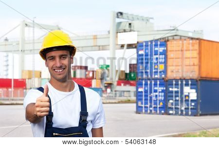Docker on a seaport showing thumb up
