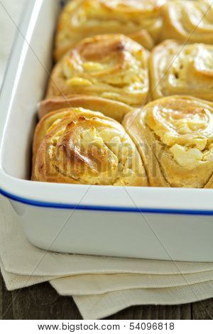 Cheese rolls with bryndza in a baking pan